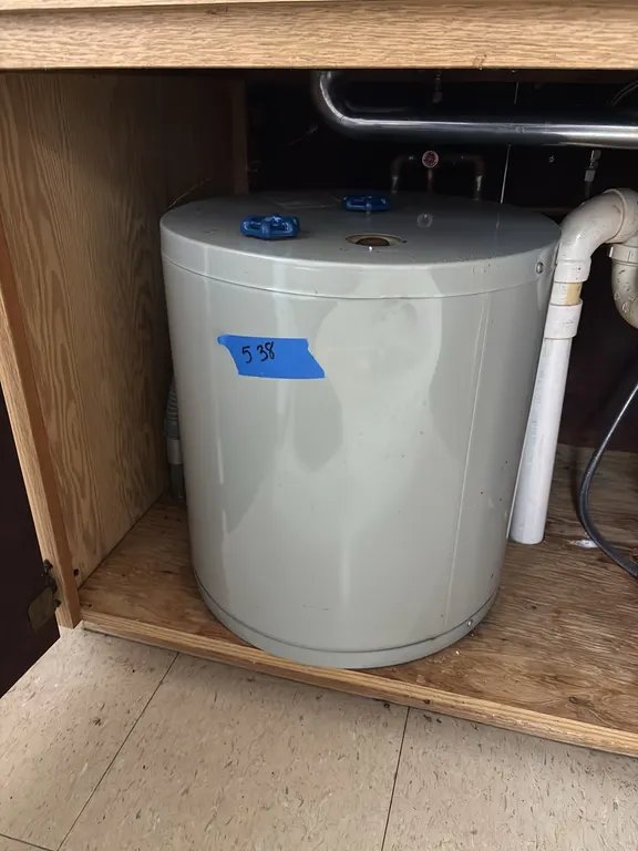 UNDER SINK WATER HEATER (BRING TOOLS AND HELP TO REMOVE