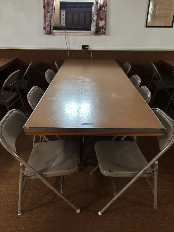 FOLDING TABLE 8’x3’ AND 8 CHAIRS