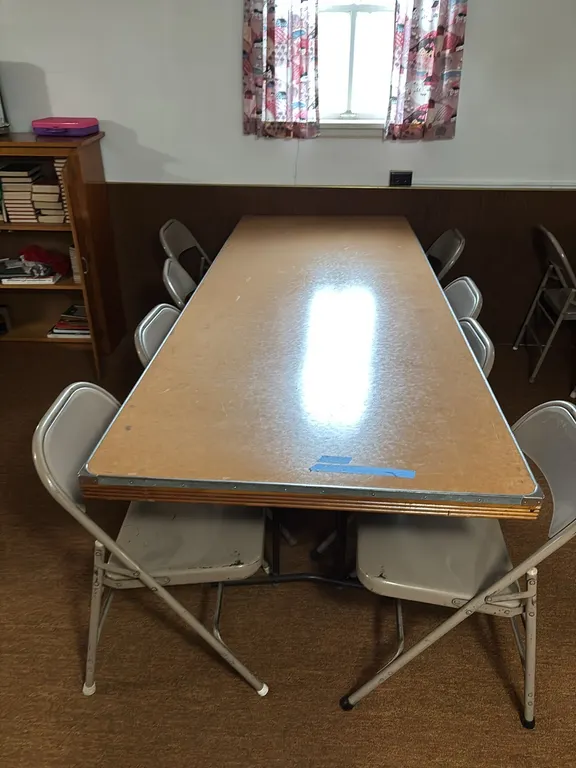 FOLDING TABLE 8’x3’ AND 8 CHAIRS
