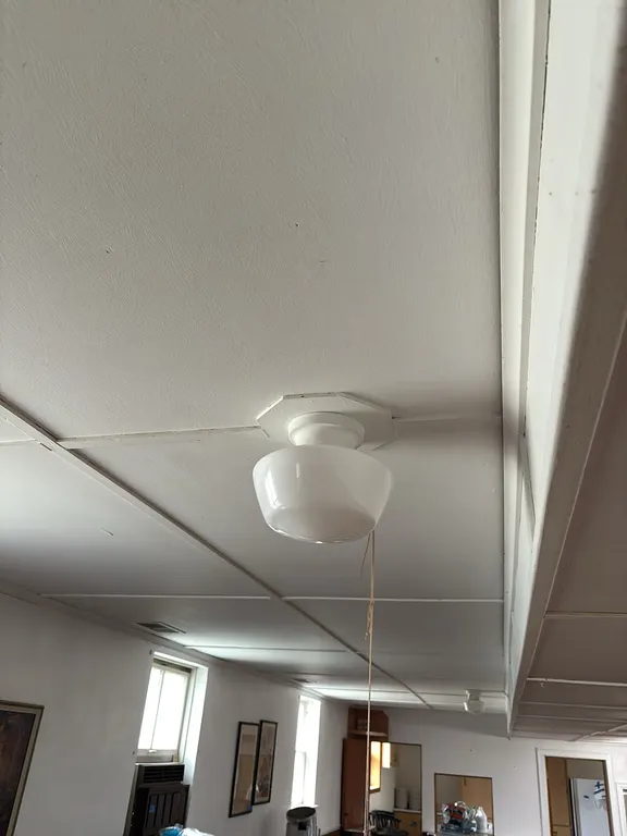 7 LIGHT FIXTURES IN DINING HALL