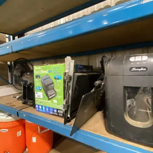 SHELF OF ASSORTED OFFICE ITEMS- PAPER SHREDDERS, TABLETOP FAN, VITAPUR WATER DISPENSER, KEYBOARD