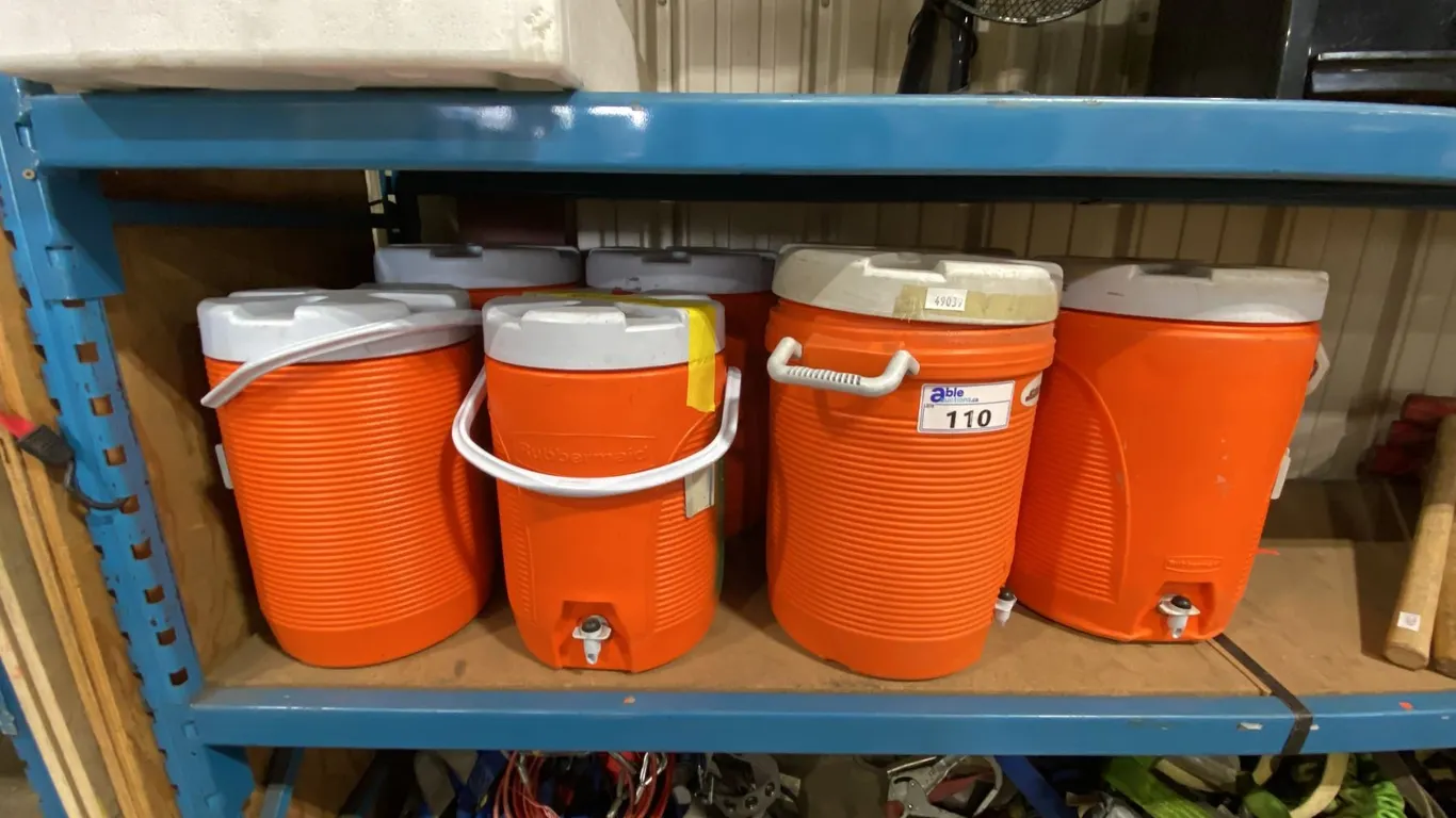 7 ORANGE RUBBERMAID COLD BEVERAGE DISPENSERS