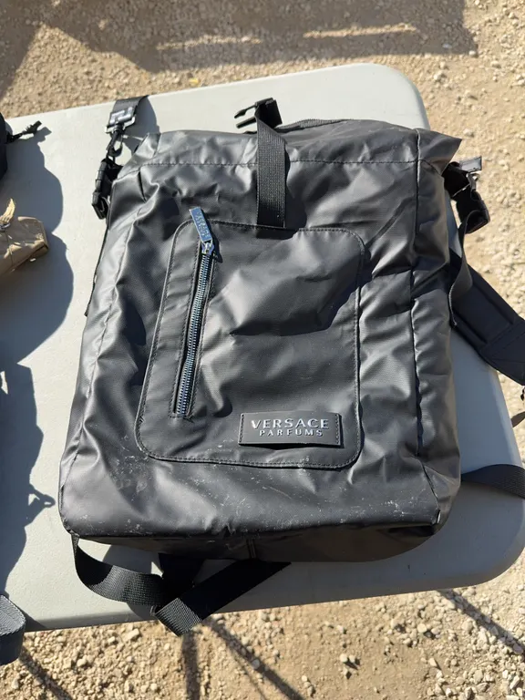 Versace Parfums Backpack Containing 2 Assorted Wallets and 5 Assorted Bags