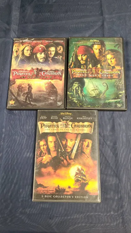 Pirates of the Caribbean DVD Trilogy With Bonus Disc