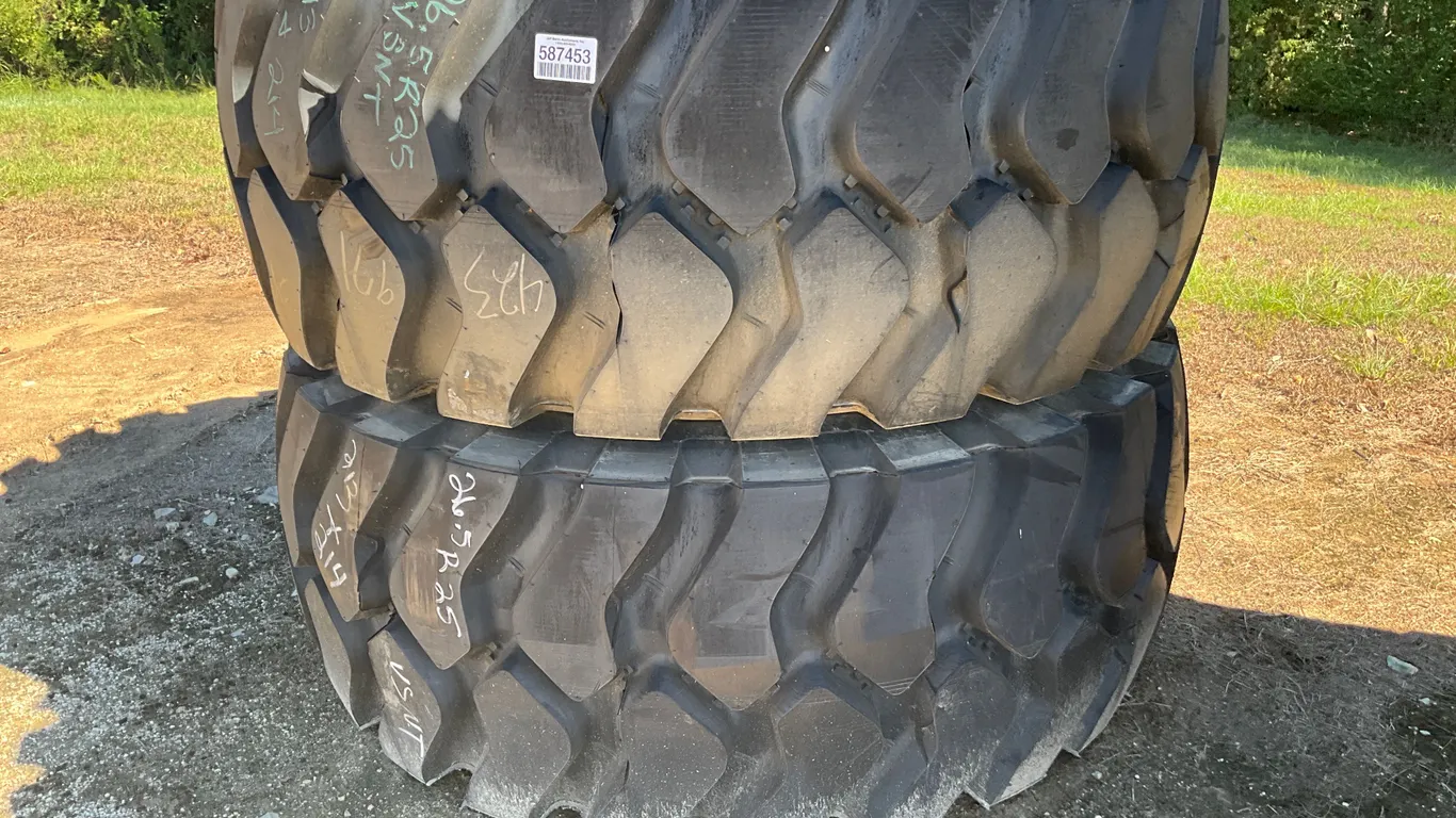 QTY OF (2) NEW BRIDGESTONE V-STEEL N-TRACTION 26.5R25 TIRES