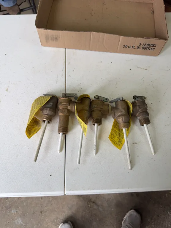 Six water heater pressure, relief valves