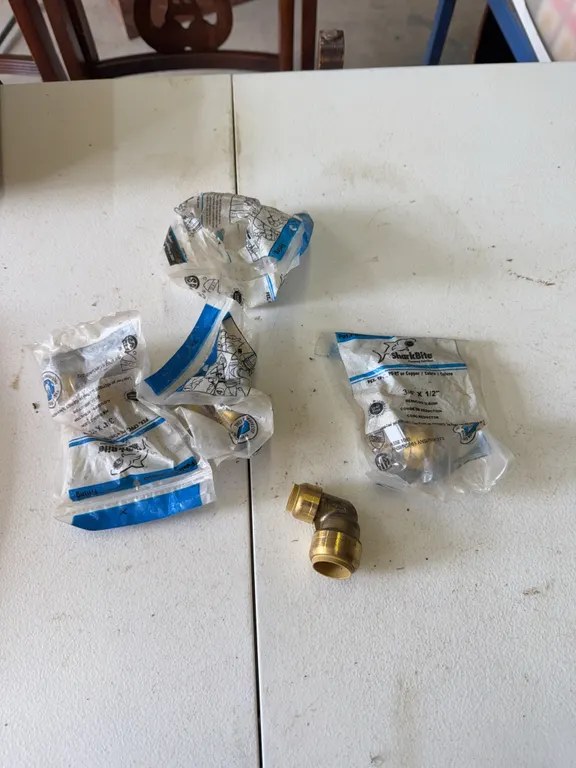Four shark bite copper reducer elbows 3/4-1/2 in