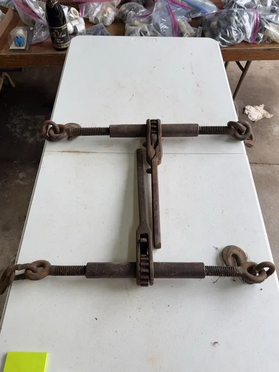 Two ratcheting chain binders