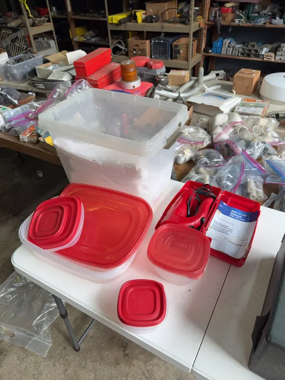 Tablecloth, electric knife, Tupperware containers, unused