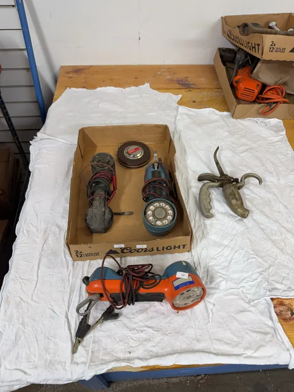 Phone/radio, lineman testers, 50 foot tape, rigid oiler