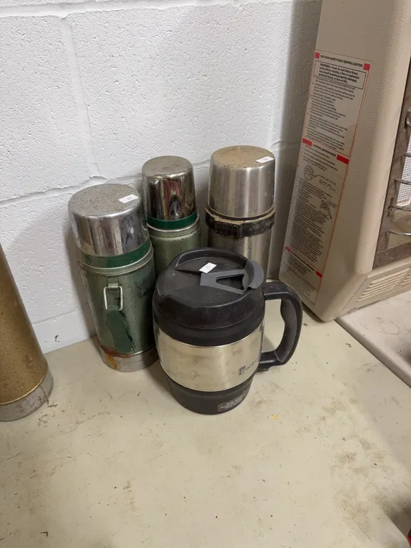 3 thermos, one Bubba keg