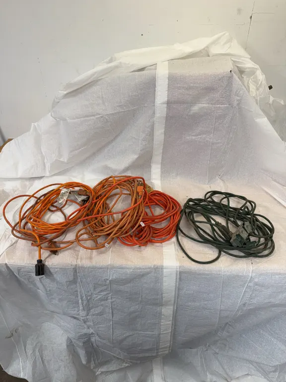 Four light duty extension cords