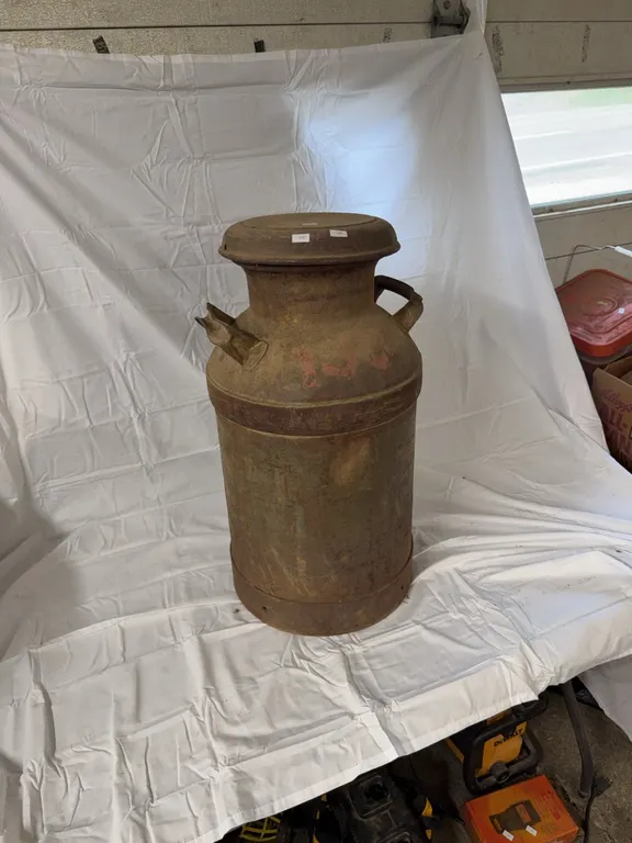 Antique milk can