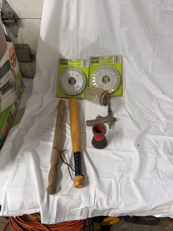 Tire thumpers, umbrella light, spray nozzle