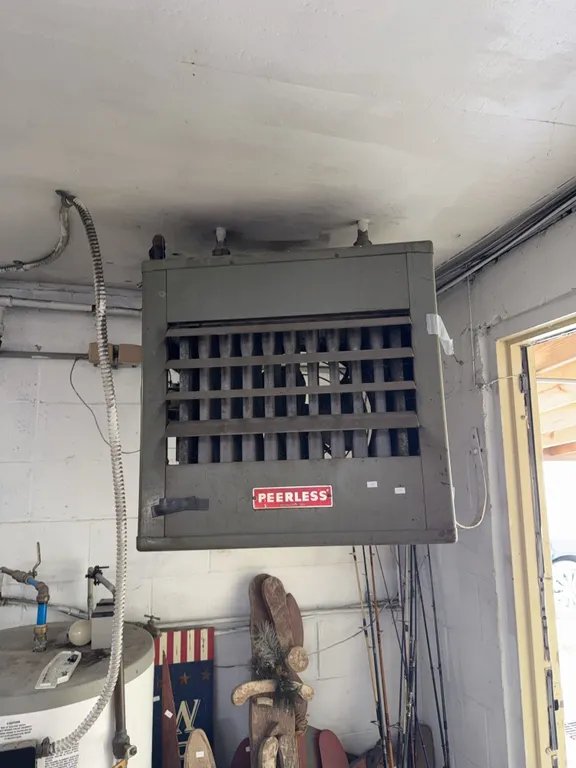 Peerless gas heater/buyer removes