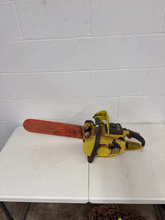 John Deere chainsaw with compression