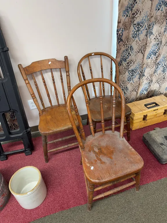 Three wooden chairs