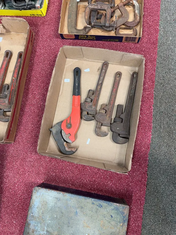 Four pipe wrenches 10 inches