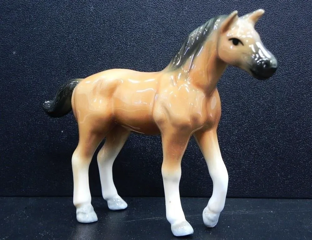 PORCELAIN HORSE FIGURINE