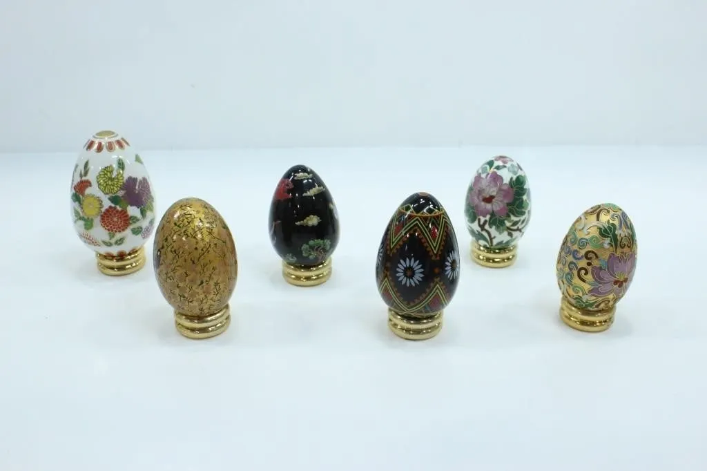 COLLECTION OF GOLD-TONE GILDED DECORATIVE EGGS