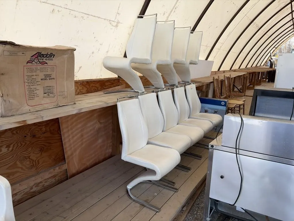 Nine White Chairs