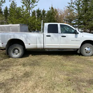 2004 Dodge 3500, diesel quad cab, 4x4, 66,000 km, loaded, 2- 5th wheel hitches, original owner, Car