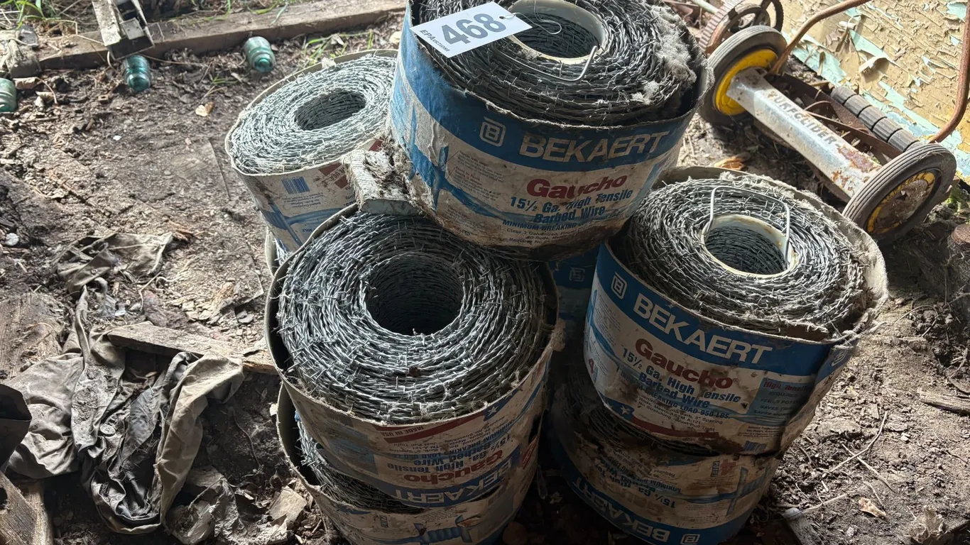 (So much each x 9) 9- Rolls of double strand barb wire