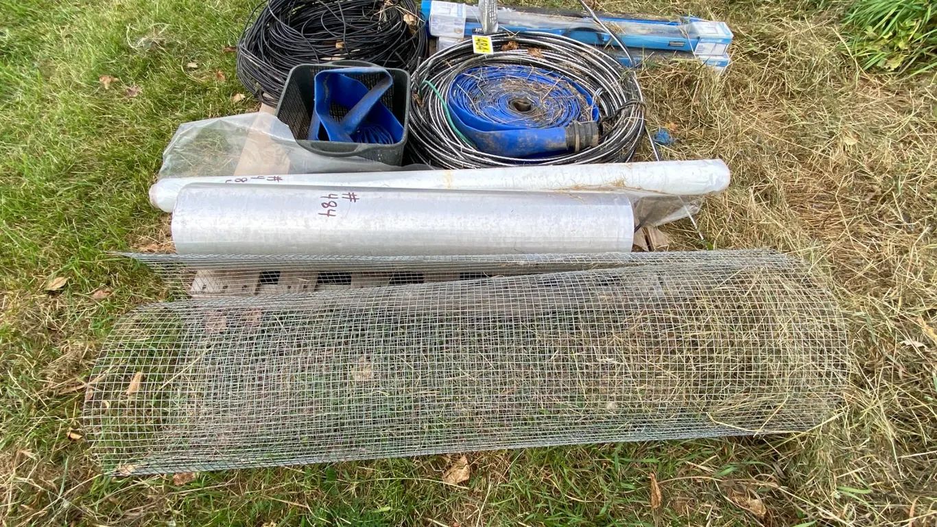 Pallet of Triplex wire, wire, water hose, poly, & saw horses