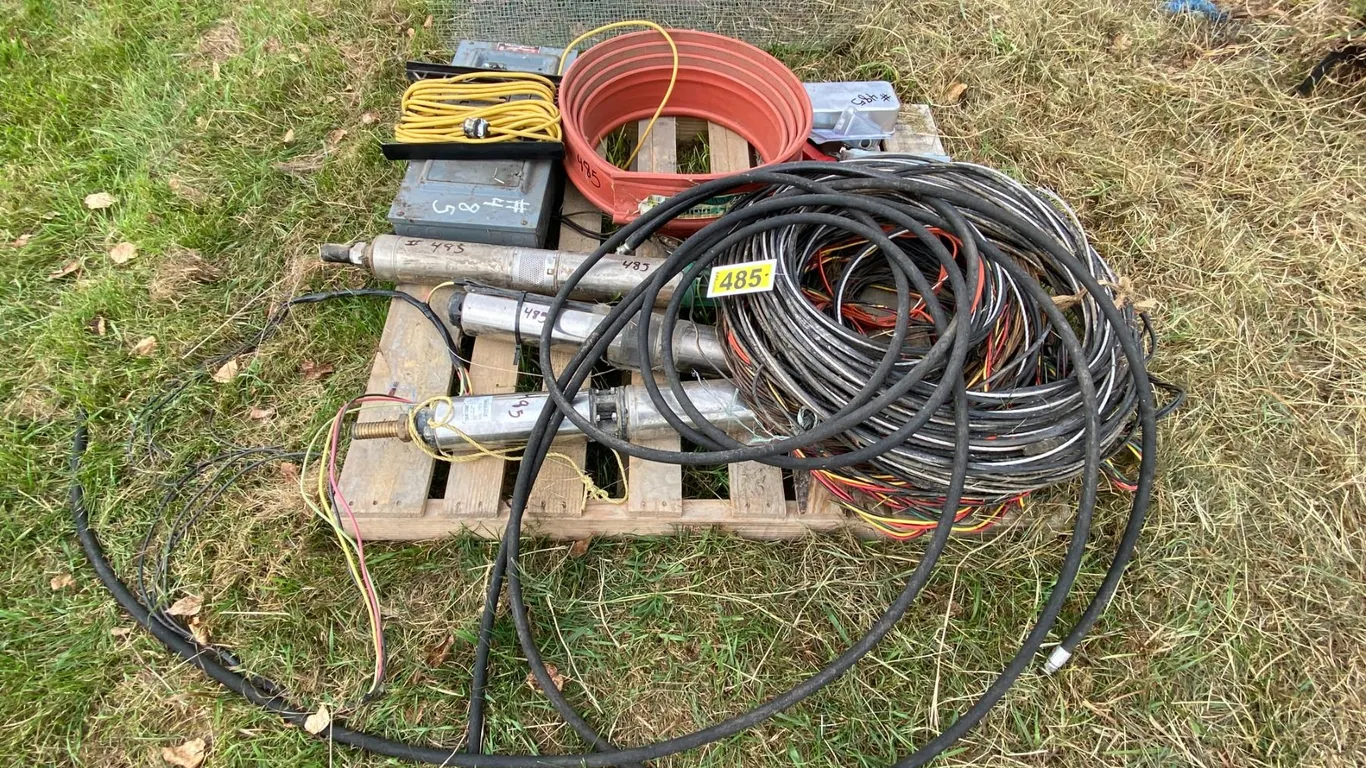 Pallet of Triplex wire, submersible pump, cords, panels, controls