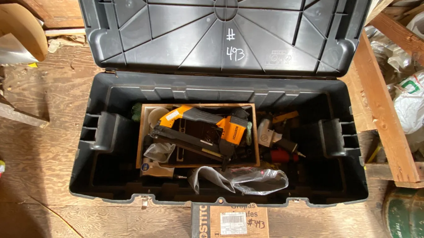 Black tote c/w Bostich nailer, air tools & contents
