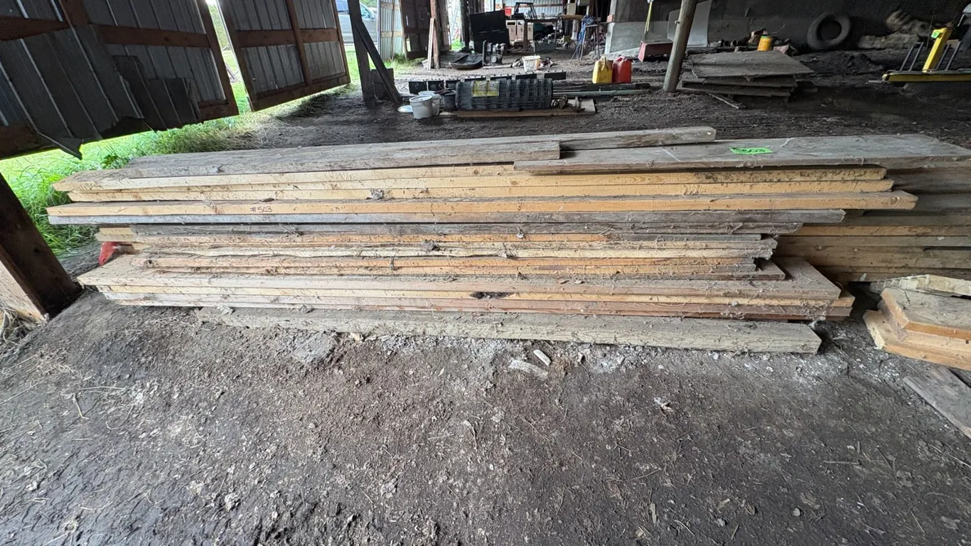 Pile of misc. lumber & door track