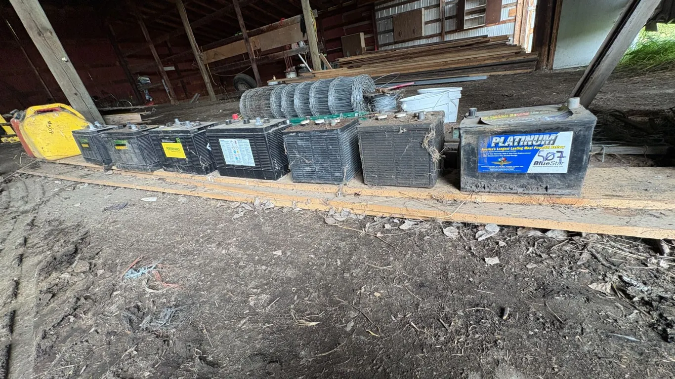 2- Jerry cans & 7- batteries