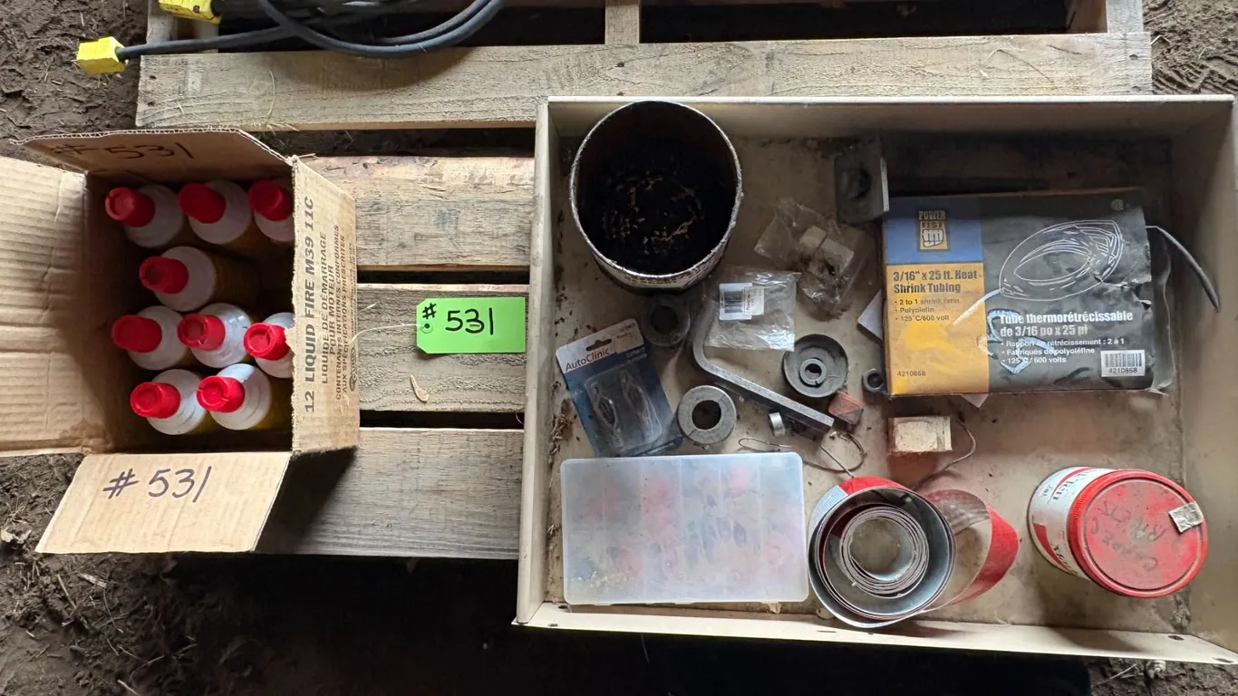 Approx. 8- cans of starting fluid & box of misc.