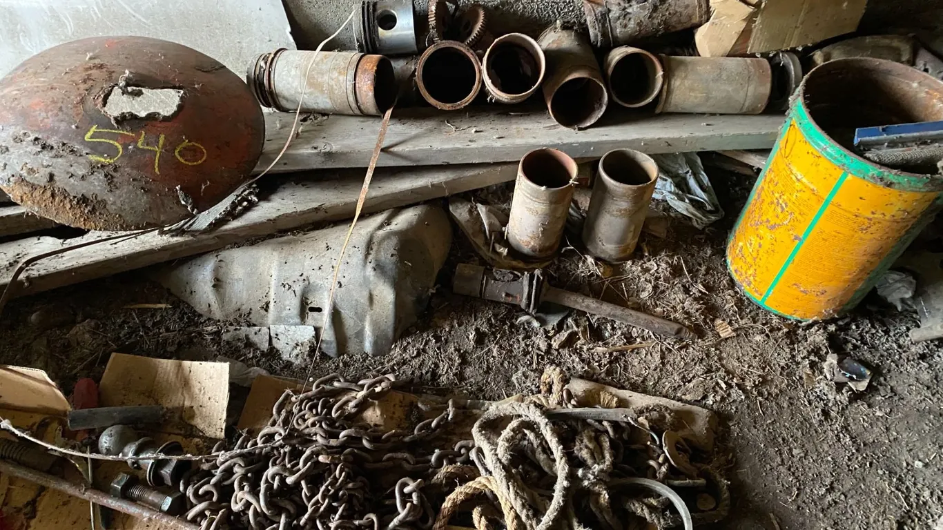 Pile of misc., steel, chain, tanks etc.