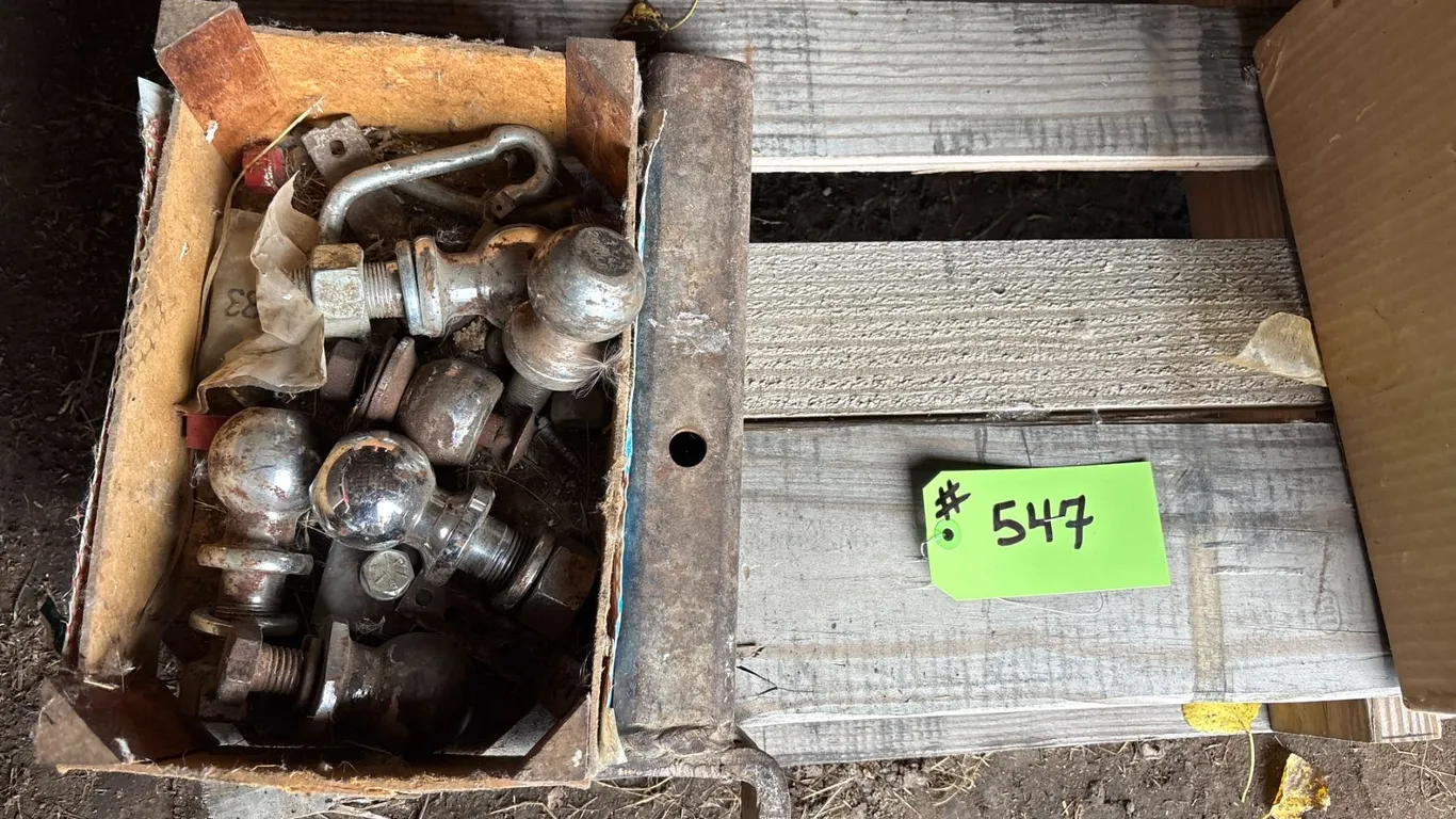 Trailer balls, qty of air & oil filters, rachet straps, jack-all, jack stands