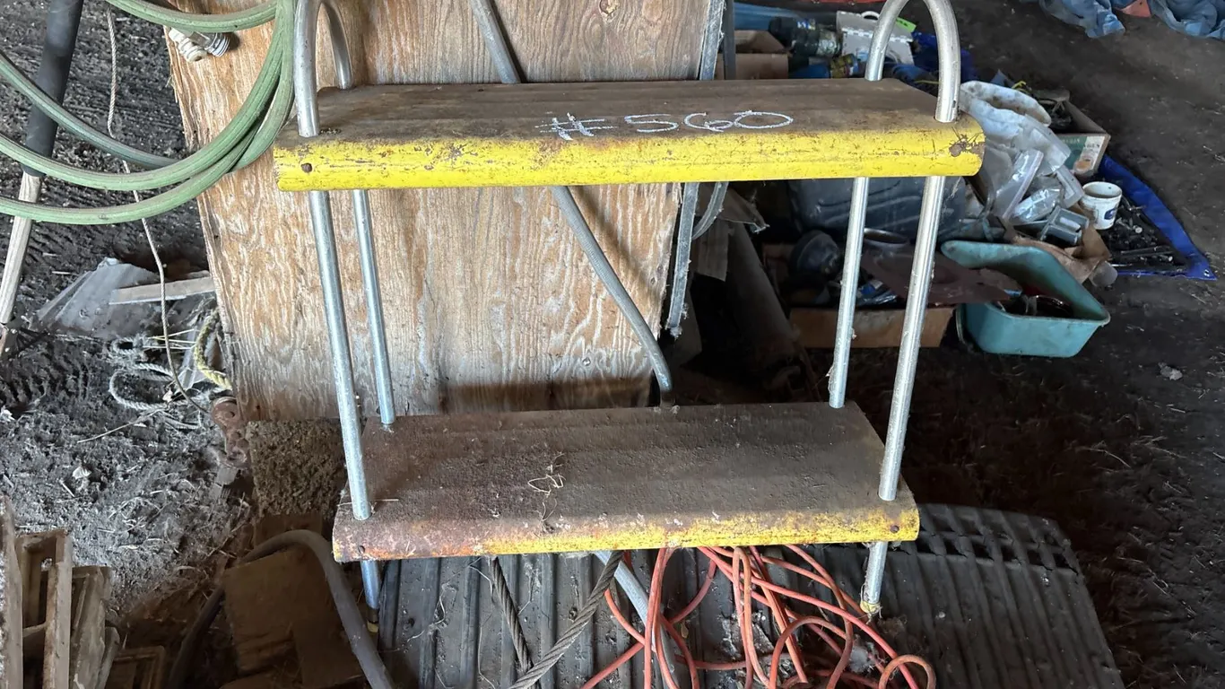 Yellow stand, ext. card, plastic grating, come-a-long, misc. wood, garden hose & leather whip