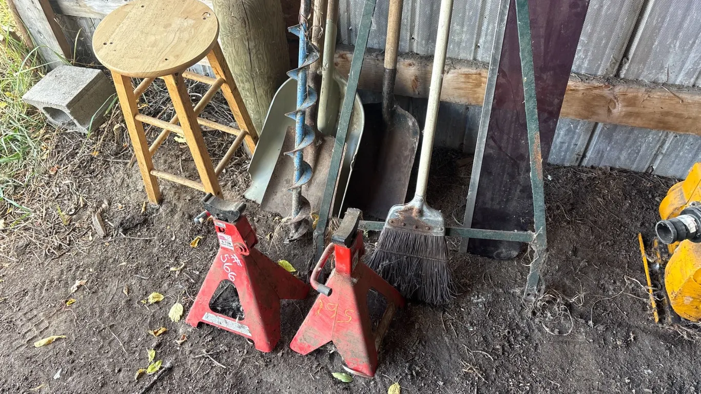 Green hitch, jack stands, shovels, broom, stool, etc.