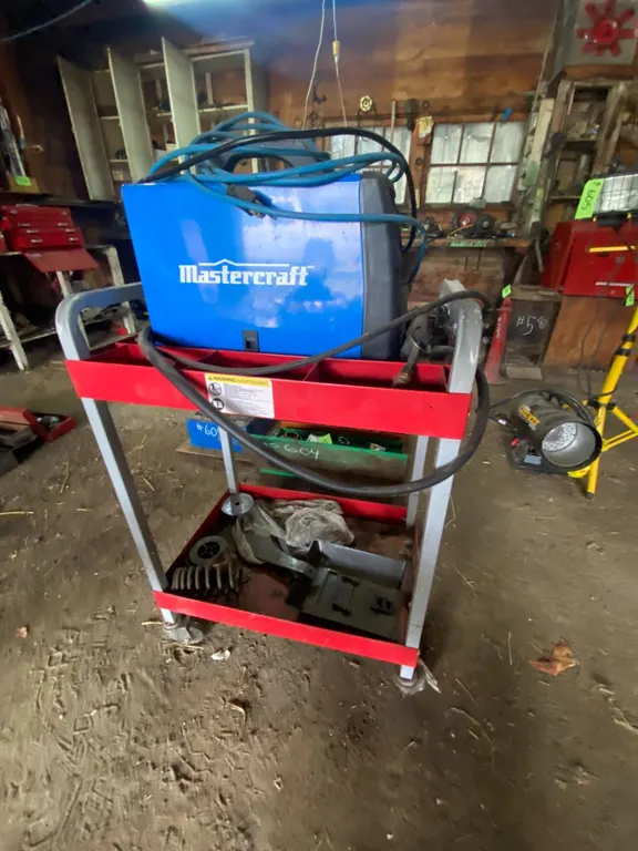 Mastercraft Mig/Flux-Core Wire Feed Welder c/w rolling cart & contents