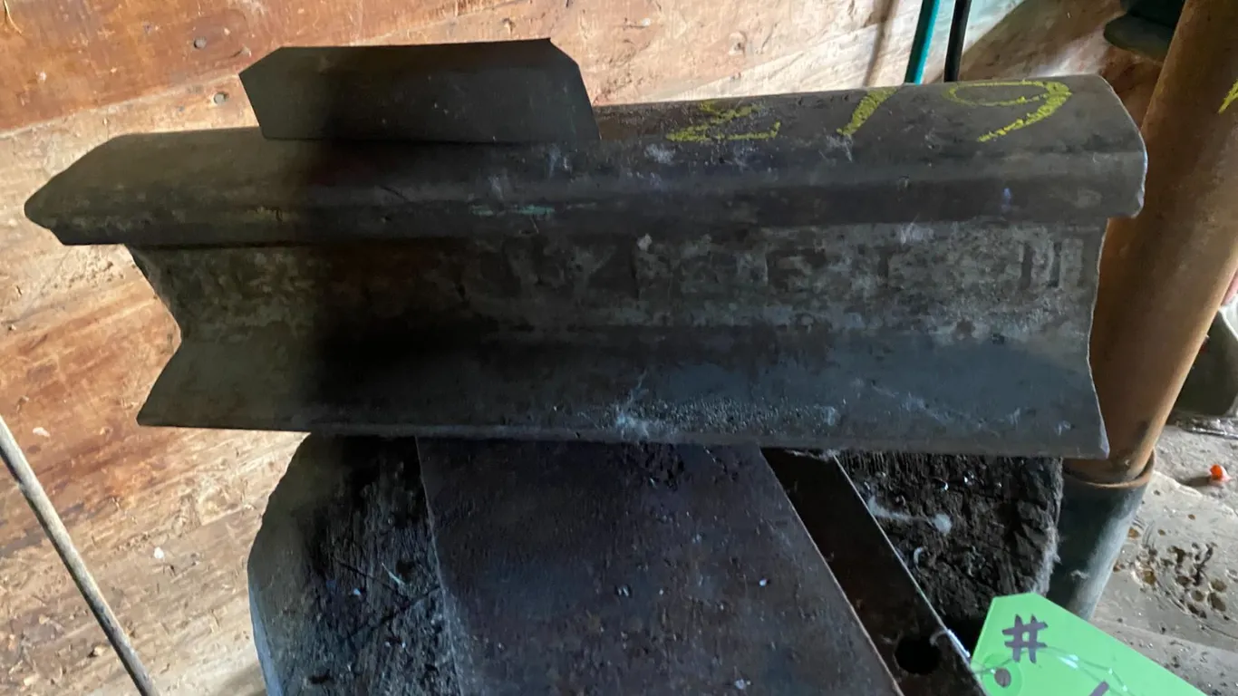 Anvil, misc. steel & pail of bolts