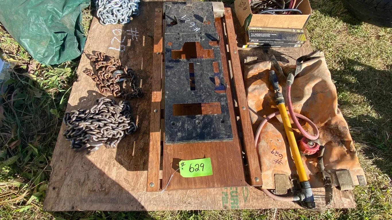 Various chains, floor creeper, bag, sprayer, battery cables etc.