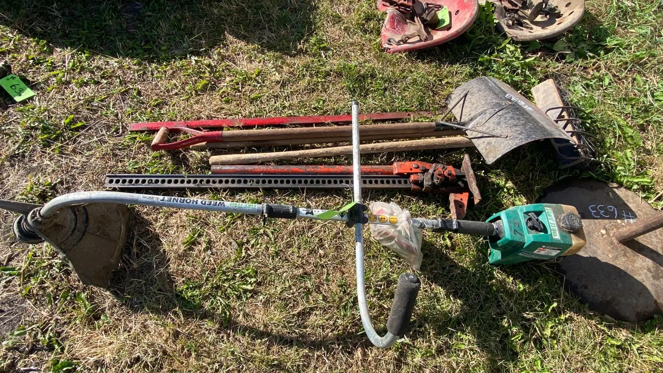 Weed eater, jack-all, snow shovels, fork & stand