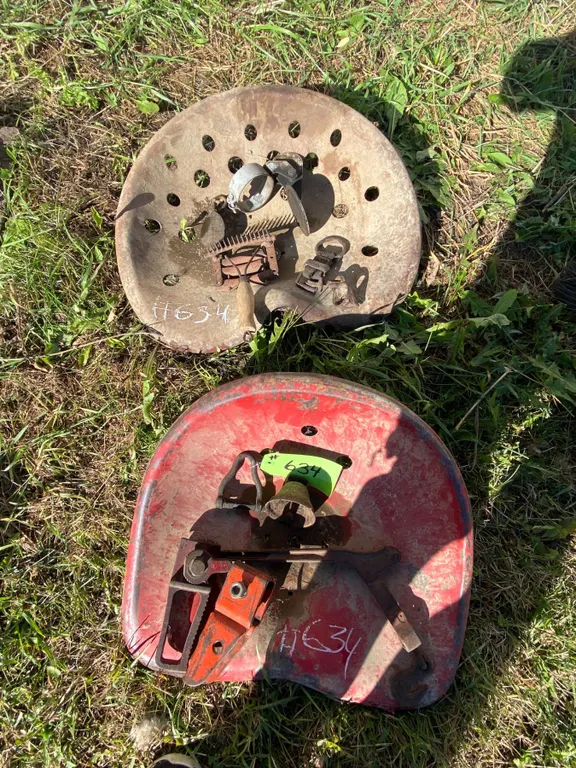 2- Implement seats, sheep bells, jack handle & muffler caps