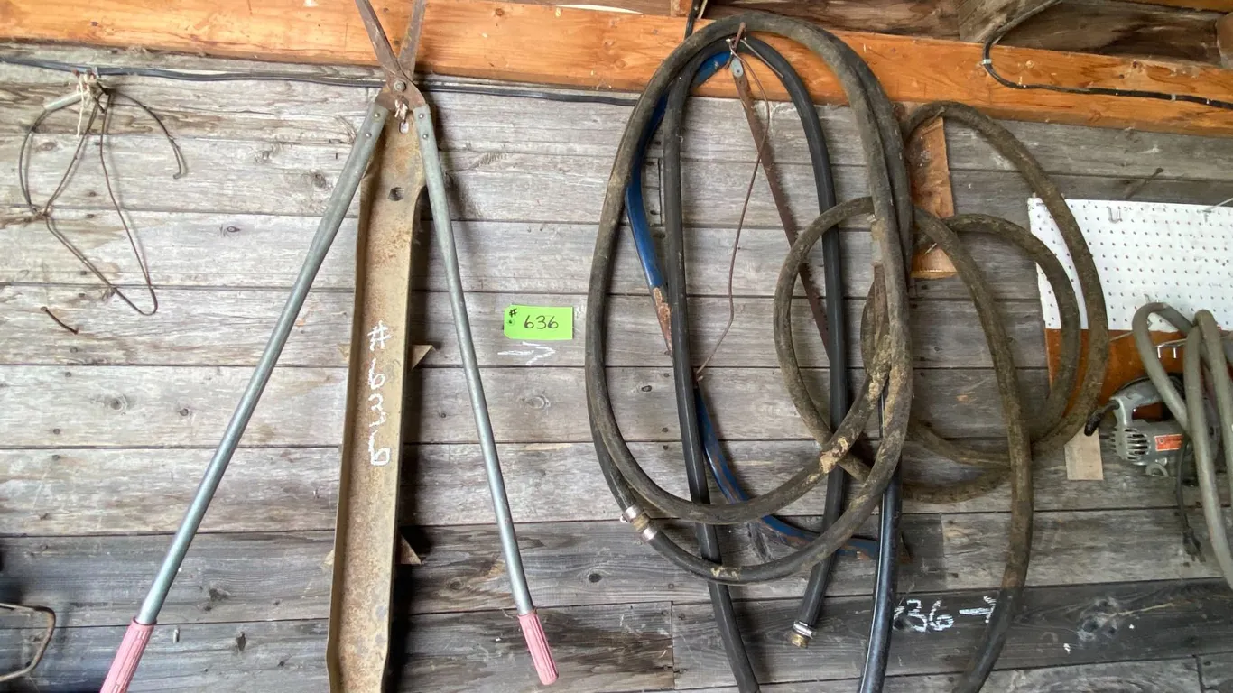 4- Wood planes, saws, turn buckles, saw blades, cable, old auger, come-a-longs & green brackets
