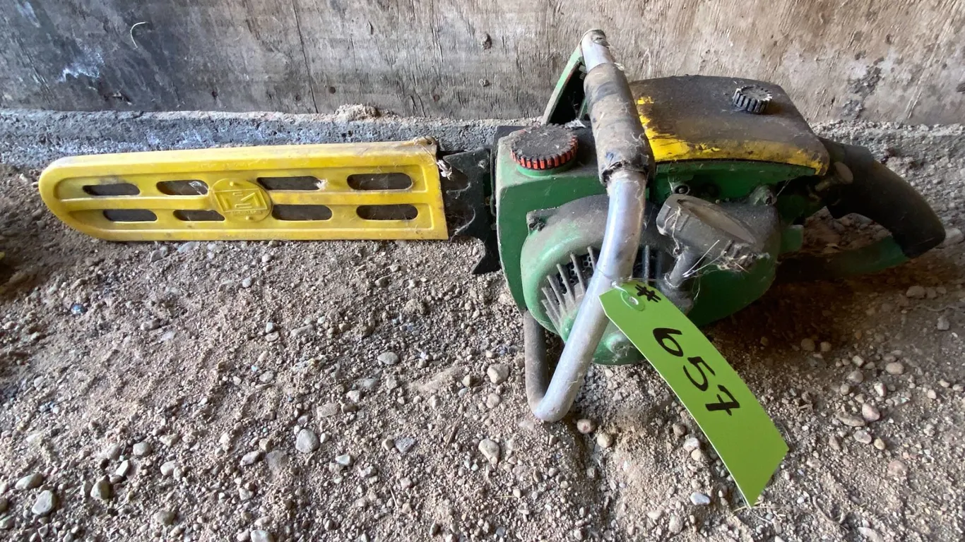 Green JD 18 chain saw