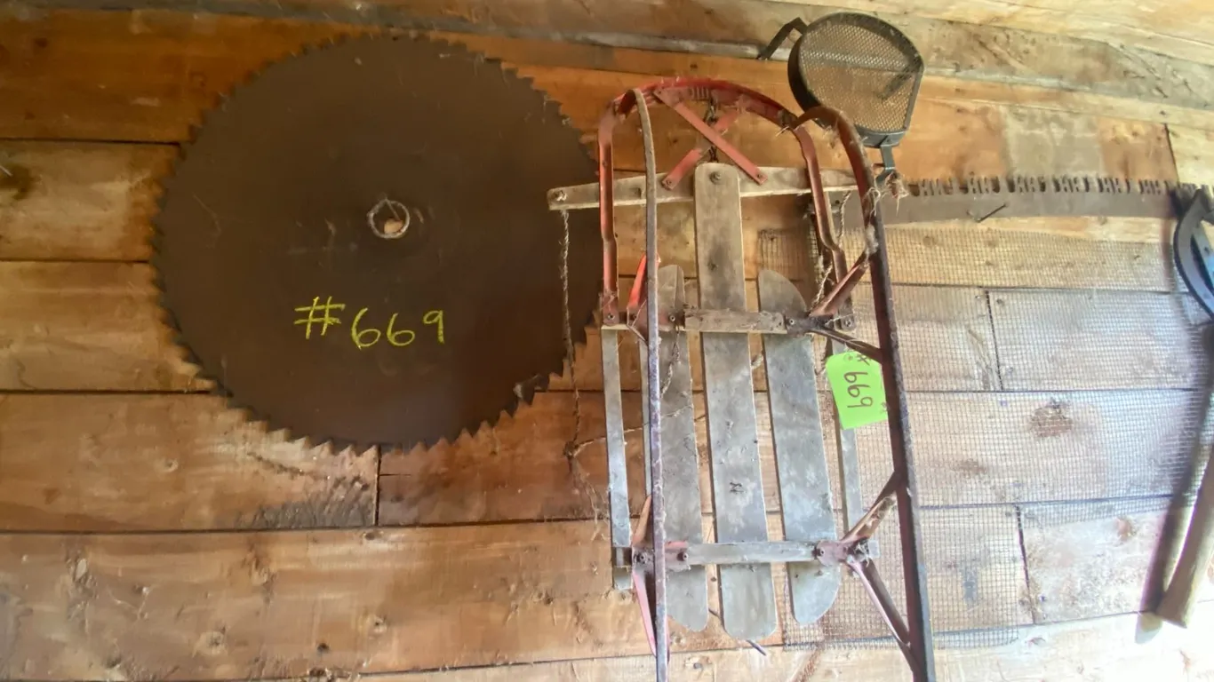 Old sleigh, saw blade