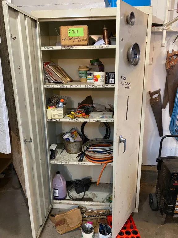 Storage cabinet & contents (Inside & in front on floor)