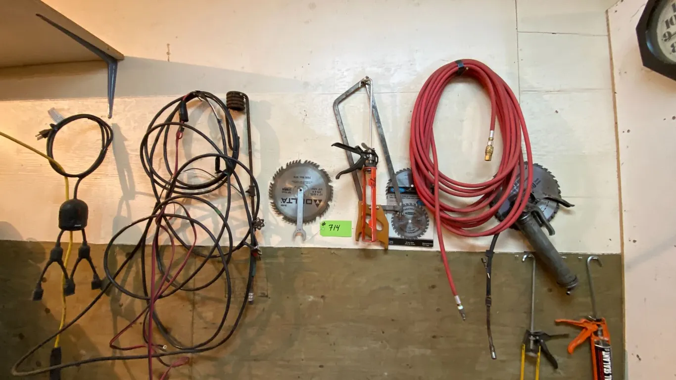 Cords, air hose, saw blades, meat saw, grease guns etc.