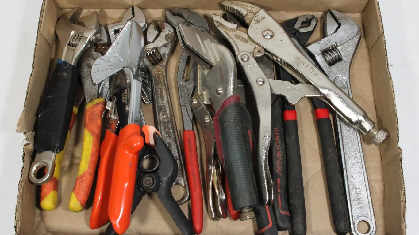 LOT OF ASSORTED WRENCHES AND PLIERS