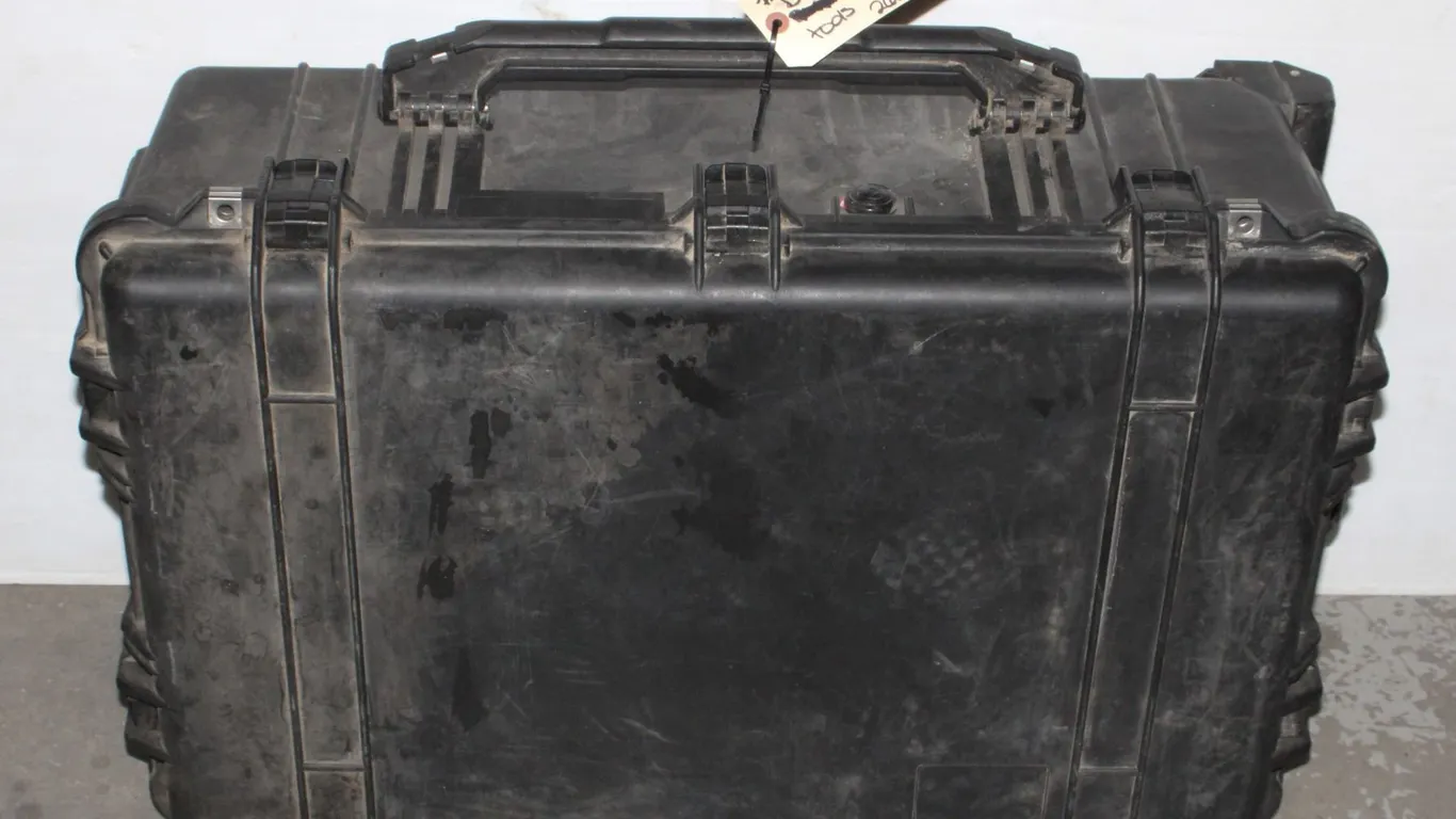 BLACK TOTE WITH TOOL BELT HAMMER HATCHET AND DRILL