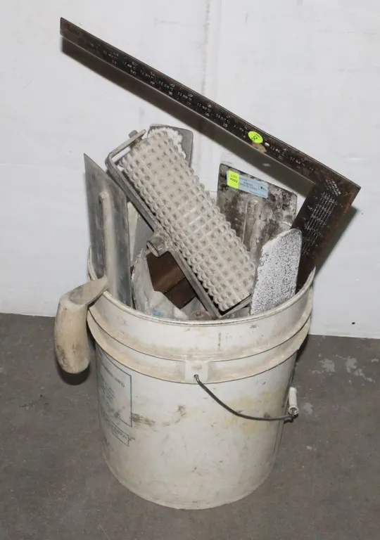 BIN OF CONCRETE TOOLS